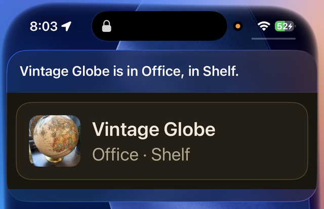 Siri answering “Vintage Globe is in Office, in Shelf” on the Lock Screen, with a card showing the globe’s photo.